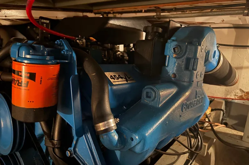 Slide: The Image of 1971 Chris-Craft 42 Commander engine, featuring a blue Crusader 454 motor with Fram oil filter. - 31