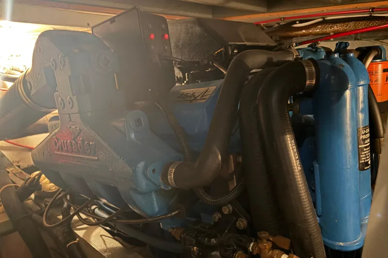 Slide: The Image of Engine of a 1971 Chris-Craft 42 Commander boat, featuring Crusader components. - 33