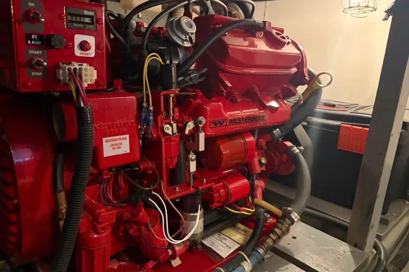 Slide: The Image of Red Westerbeke engine in a 1971 Chris-Craft 42 Commander boat. - 36