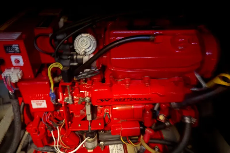 Slide: The Image of Red Westerbeke engine in a 1971 Chris-Craft 42 Commander boat. - 37