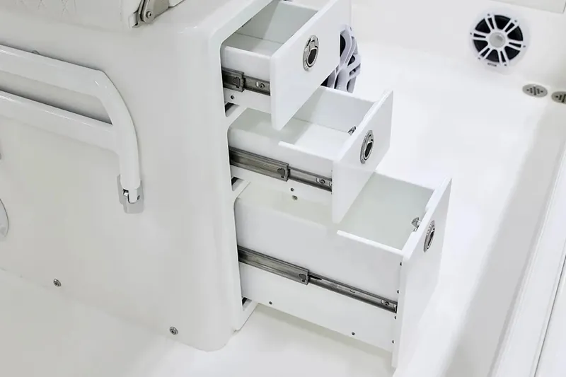 Slide: The Image of Open storage drawers on a 2027 Regulator 30XO boat, showcasing sleek design and functionality. - 18