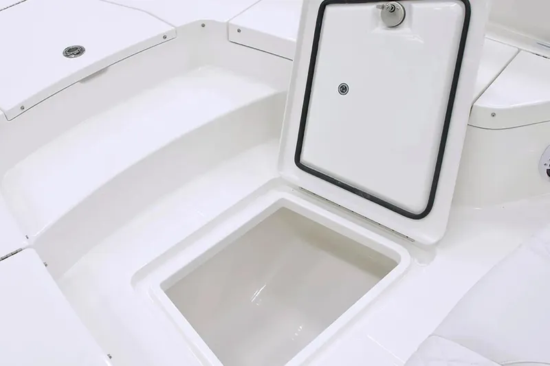 Slide: The Image of Open storage compartment on 2027 Regulator 30XO boat, showcasing interior space. - 20