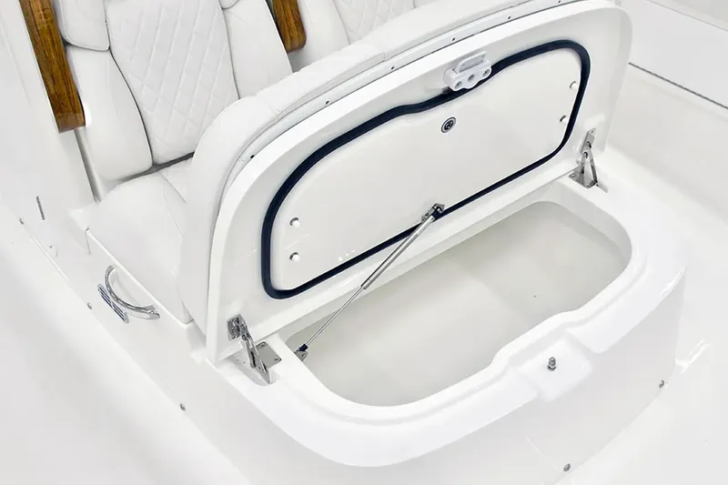 Slide: The Image of 2027 Regulator 30XO boat seat with open storage compartment. - 21