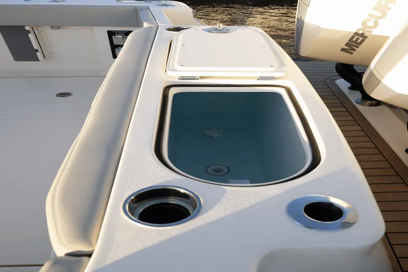 Slide: The Image of Scout 357 LXF 2027: Sleek deck with integrated storage and cup holders. - 38