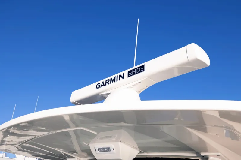 Slide: The Image of Garmin radar on a Scout 357 LXF boat, clear blue sky in the background. - 15