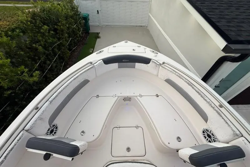 Slide: The Image of 2020 Robalo R222 Explorer boat interior with seating and storage compartments. - 11