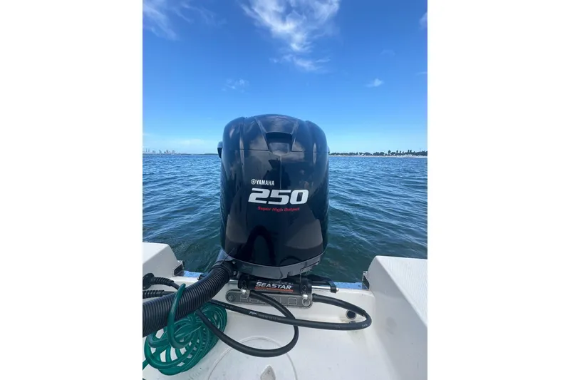 Slide: The Image of 2021 Robalo R222 Center Console with Yamaha 250 engine on open water. - 38
