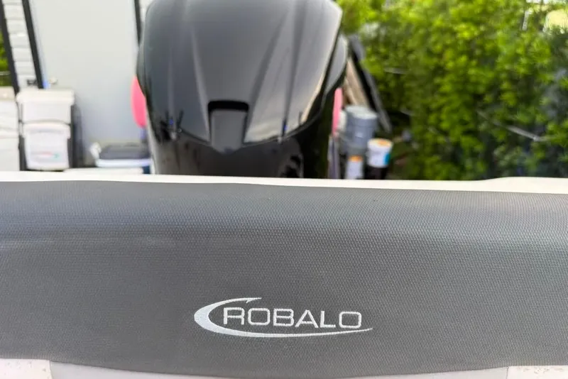 Slide: The Image of 2020 Robalo R222 Explorer boat with visible logo and engine in background. - 39