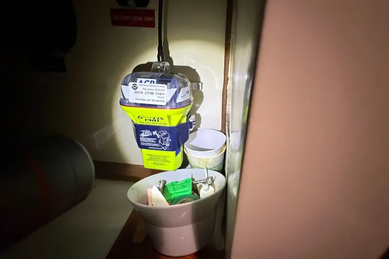 Slide: The Image of Emergency beacon and equipment inside a 1978 CSY 44 Center Cockpit yacht. - 26