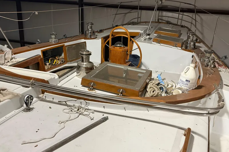Slide: The Image of 1978 CSY 44 Center Cockpit sailboat interior with ropes, winches, and wooden accents. - 4