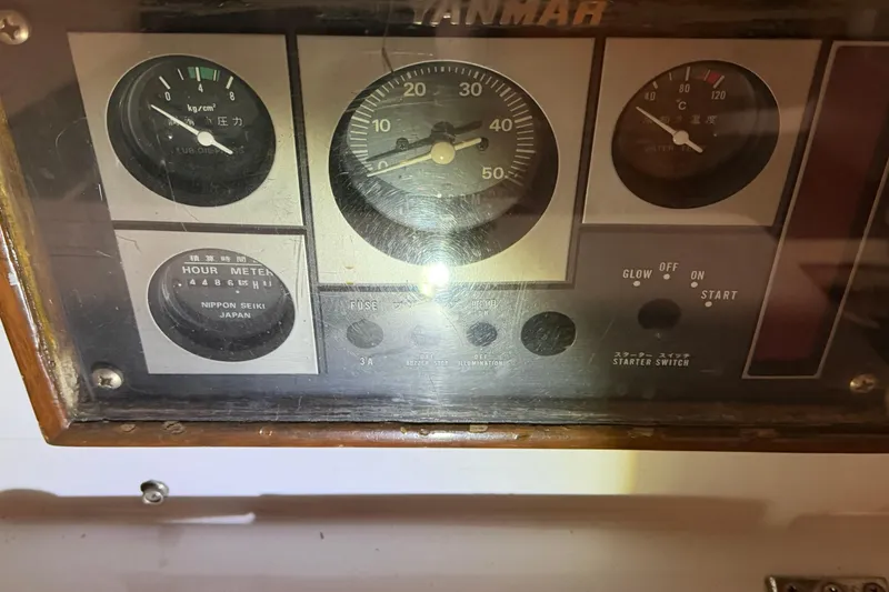 Slide: The Image of Instrument panel of a 1978 CSY 44 Center Cockpit sailboat with Yanmar gauges. - 8