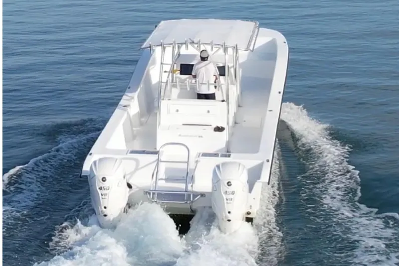 Slide: The Image of 2025 AmeraCat 39 boat cruising on open water with dual engines. - 3
