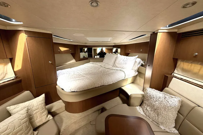 Slide: The Image of Luxurious interior of 2013 Sea Ray Sundancer 350 yacht with cozy bed and elegant furnishings. - 17