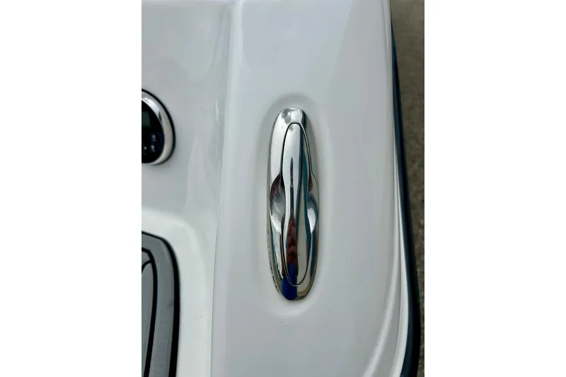 Slide: The Image of Chrome cleat on 2015 Yamaha Boats AR210, showcasing sleek design and functionality. - 23