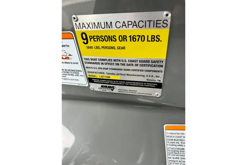 Slide: The Image of Yamaha AR210 2015 boat capacity label, maximum 9 persons or 1670 lbs. - 28
