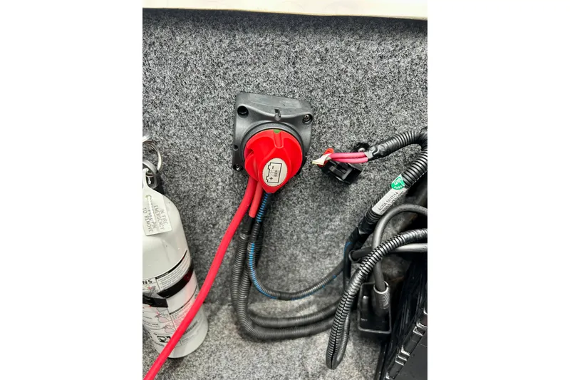 Slide: The Image of Battery switch and wiring inside a 2015 Yamaha Boats AR210. - 45