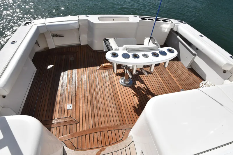 Slide: The Image of Cabo 40 Express 2005 with spacious teak deck and fishing station. - 13