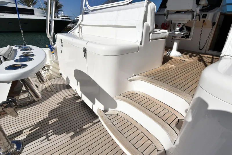 Slide: The Image of Cabo 40 Express 2005 with wooden deck and seating area. - 17