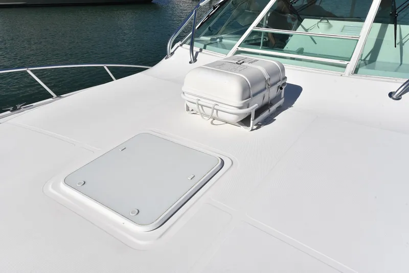 Slide: The Image of Cabo 40 Express 2005 on water with deck view. - 31