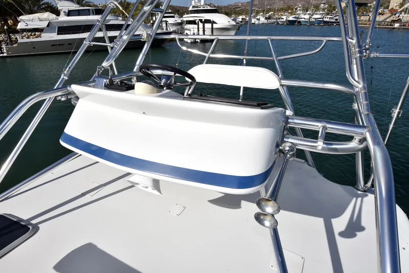 Slide: The Image of Cabo 40 Express 2005 helm station on the water. - 35
