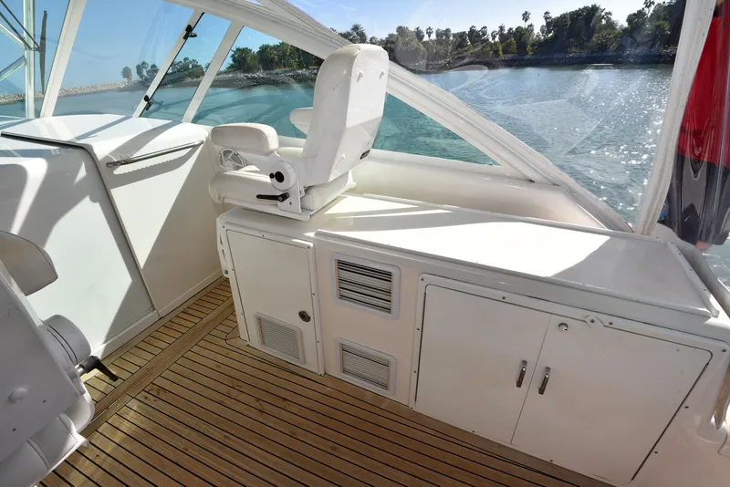 Slide: The Image of Cabo 40 Express 2005 with wooden flooring and seating area. - 46