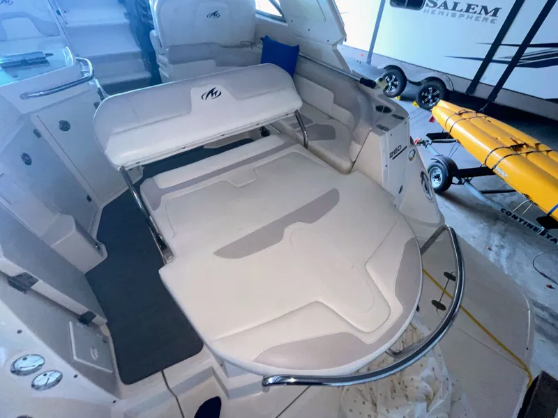 Slide: The Image of Interior of a 2010 Monterey 280 Sport Cruiser boat. - 16