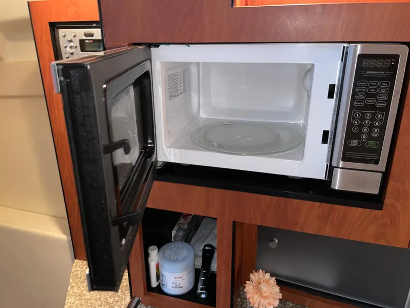 Slide: The Image of Open microwave in a Monterey 280 Sport Cruiser yacht. - 45