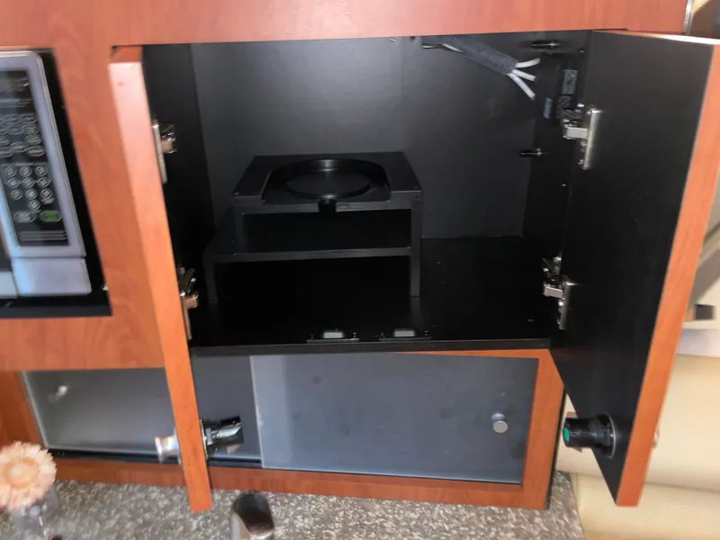 Slide: The Image of Open cabinet in Monterey 280 Sport Cruiser 2010. - 46