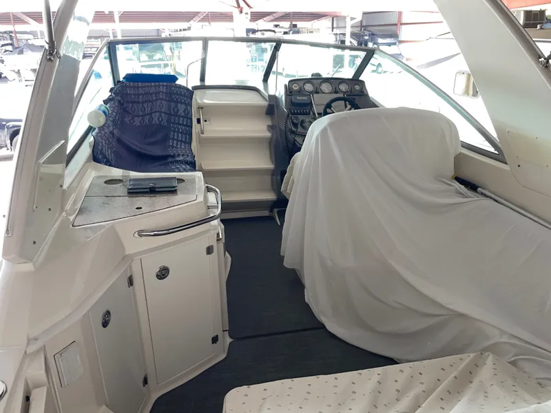 Slide: The Image of Interior of a 2010 Monterey 280 Sport Cruiser in dock. - 13