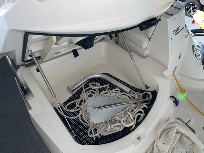 Slide: The Image of Monterey 280 Sport Cruiser 2010 anchor locker with ropes and anchor. - 17