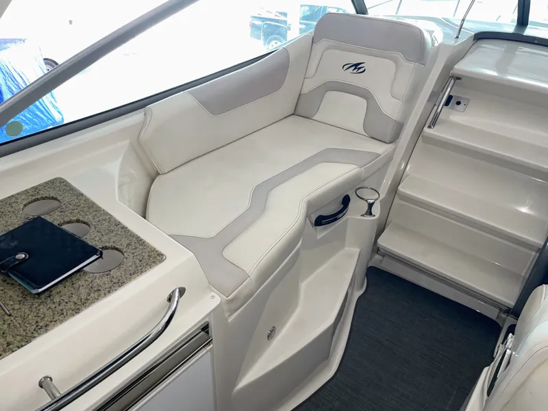 Slide: The Image of Interior of a 2010 Monterey 280 Sport Cruiser boat. - 22
