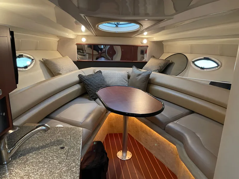 Slide: The Image of Interior of 2010 Monterey 280 Sport Cruiser with cozy seating area. - 33