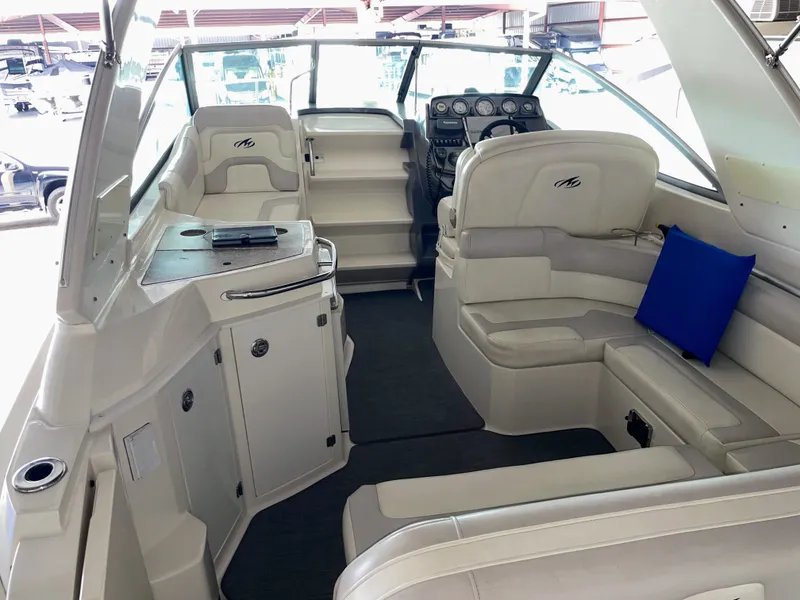 Slide: The Image of Interior of a 2010 Monterey 280 Sport Cruiser boat. - 15