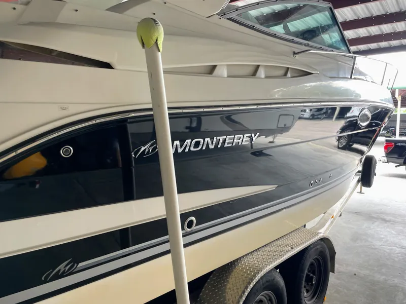 Slide: The Image of Monterey 280 Sport Cruiser 2010 on trailer in storage facility. - 6