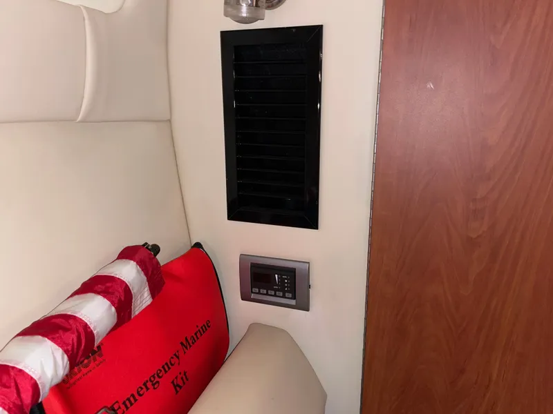 Slide: The Image of Interior of a Monterey 280 Sport Cruiser with emergency kit. - 38