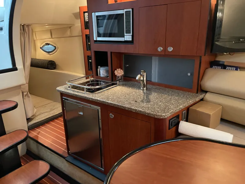 Slide: The Image of Interior of 2010 Monterey 280 Sport Cruiser with kitchenette. - 35