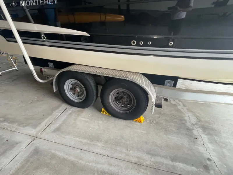 Slide: The Image of Monterey 280 Sport Cruiser 2010 on trailer in garage. - 3