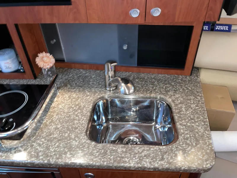 Slide: The Image of Kitchen area of 2010 Monterey 280 Sport Cruiser with sink. - 48