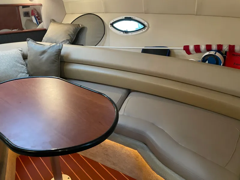 Slide: The Image of Interior of 2010 Monterey 280 Sport Cruiser with table and seating area. - 34