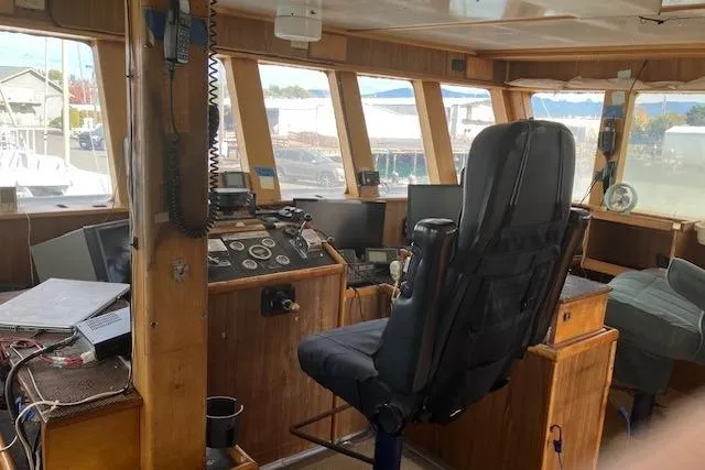 Slide: The Image of Interior of a 1995 Custom Steel Albacore Tuna Vessel's control room with navigation equipment. - 1