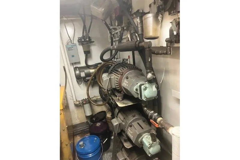 Slide: The Image of Engine room of a 1995 Custom Steel Albacore Tuna Vessel, showcasing machinery and equipment. - 8