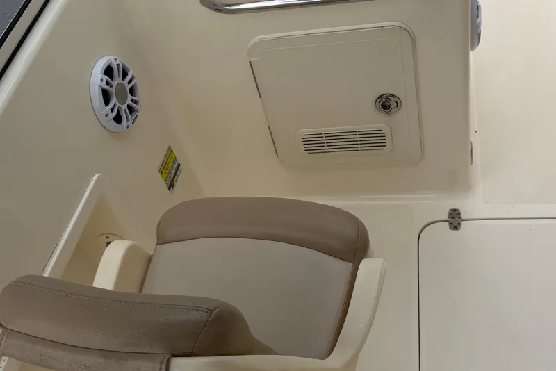 Slide: The Image of Interior of 2023 Scout 210 Dorado boat with seat and speaker. - 6
