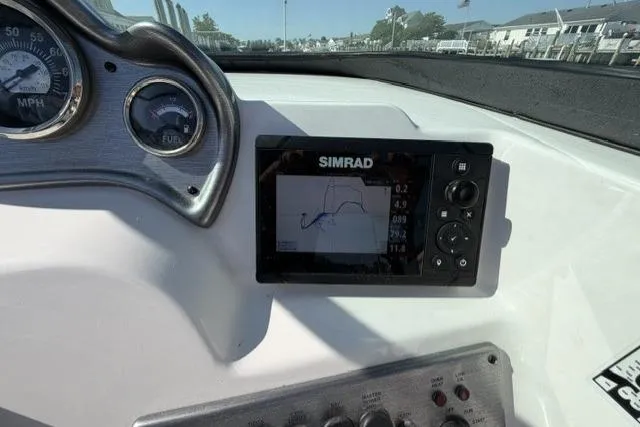 Slide: The Image of Dashboard of 2023 NauticStar 223 DC boat with Simrad navigation system. - 12