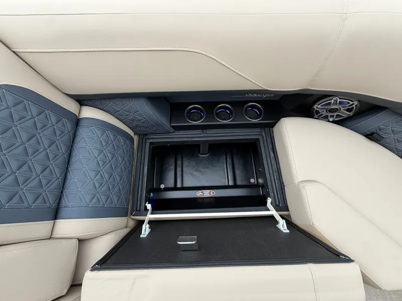 Slide: The Image of The image shows the interior of a 2027 Harris 230SOL with sleek seating and speakers. - 46