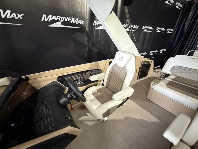 Slide: The Image of Interior of a 2027 Harris 250CRW with beige and white seating. - 44