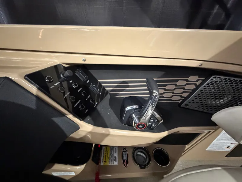 Slide: The Image of The image shows the helm of a Harris 250CRW boat with modern controls. - 43