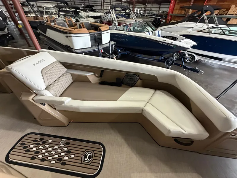 Slide: The Image of Interior of a 2027 Harris 250CRW with beige upholstery and modern design. - 30