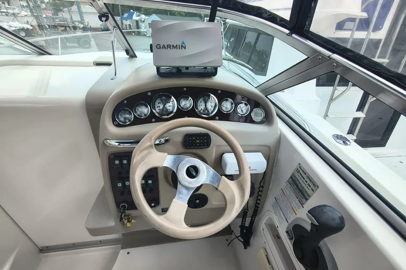 Slide: The Image of 2004 Chaparral Signature 240 boat dashboard with Garmin navigation system. - 8