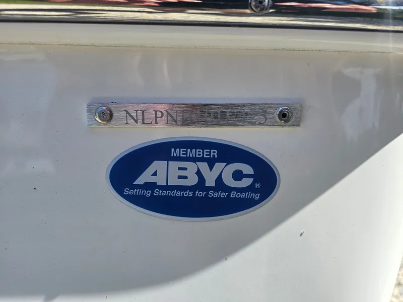 Slide: The Image of Tidewater Bay Max 1910 boat with ABYC member plaque. - 13