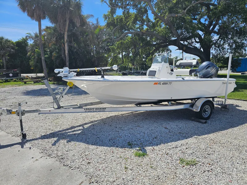 Slide: The Image of 2025 Tidewater Bay Max 1910 boat on trailer outdoors. - 3